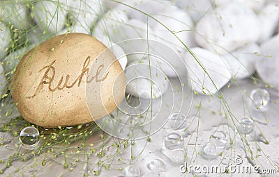 Spa background with a stone and a german word for calmness Stock Photo