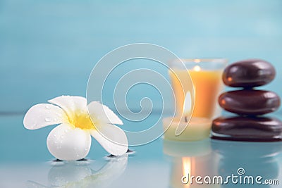 Spa concept with candle, stone, flower and bamboo Stock Photo