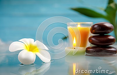 Spa concept with candle, stone, flower and bamboo Stock Photo