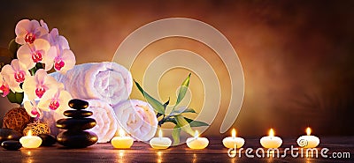 Spa Concept - Massage Stones With Towels And Candles Stock Photo