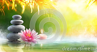 Spa - Relaxation With Massage Stones And Waterlily Stock Photo