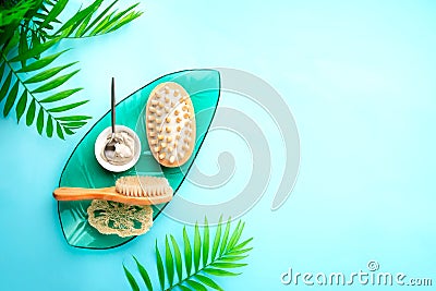 Spa setting background with cosmetic clay and massage brushes Stock Photo