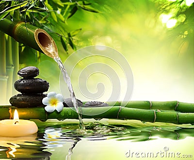 spa stones in garden with flow water Stock Photo