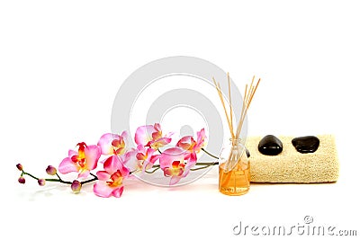 Spa towel, fragrance sticks, rocks and orchid Stock Photo