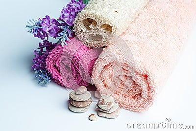 Spa towels rolls, flower and stones. Stock Photo