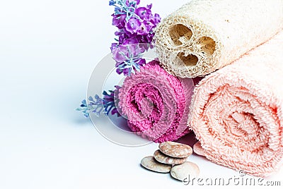 Spa towels rolls, flower and stones. Stock Photo
