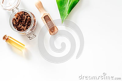 Spa treatment. Coffee scrub on white background top view copyspace Stock Photo