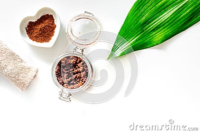 Spa treatment. Coffee scrub on white background top view copyspace Stock Photo