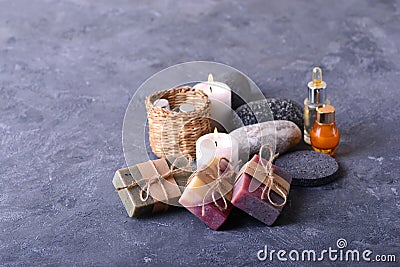 Spa treatment concept backgroud with handmade soap collection, candles and spa accessories Stock Photo