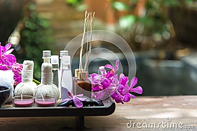 Spa treatment and product for female feet and manicure nails spa with pink flower, copy space, soft and select focus, Stock Photo