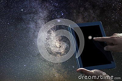 Space Astronomy Exploration Concept. Jupiter planet tablet. Stock Photo