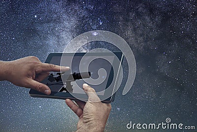 Space Astronomy Exploration Concept. Night Sky tablet Telescope Stock Photo