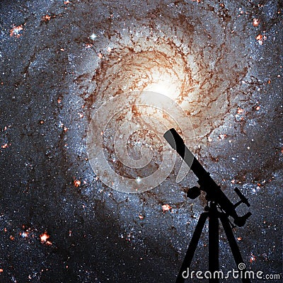 Space background with silhouette of telescope. Messier 74 Stock Photo