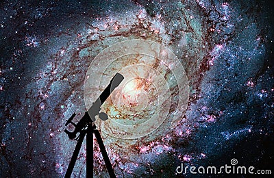 Space background with silhouette of telescope. Messier 83 Stock Photo