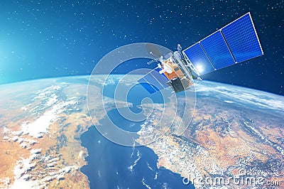 Space communications satellite in low orbit around the Earth. Elements of this image furnished by NASA. Stock Photo