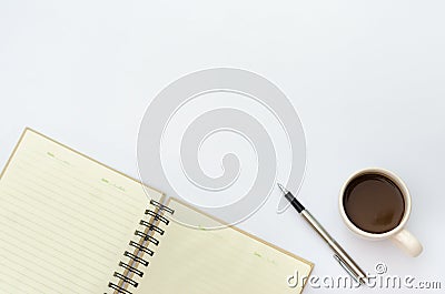 Flay lay space on the desk Area space enter text. mockup coffee cups, Pen note paper Placed on a White table wood Stock Photo