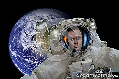 Space exploration. Astronaut in outer space. Planet earth from space on a dark background. Elements of this image were furnished Stock Photo