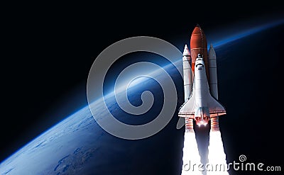 Space Rocket in the space on orbit of Earth planet Stock Photo