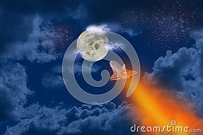 Space Shuttle flying to the moon in a starry and cloudy night. Red and orange fuel. Artistic impression. Stock Photo