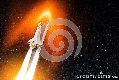 Spaceship flight. Glowing space shuttle with smoke and blast takes off into the starry sky. Rocket starts into space. Stock Photo