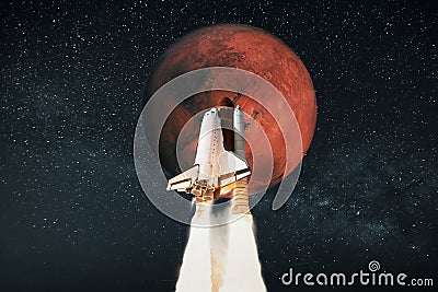 Spaceship launched on the red planet Mars. Space rocket flies to the planet on starry sky. Travel concept Stock Photo