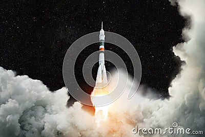 Spaceship launches into space. Rocket takes off against the background of the starry sky. Rocket liftoff. Stock Photo