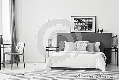 Spacious contrast bedroom interior Stock Photo