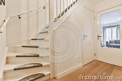 Spacious corridor with a side staircase Stock Photo