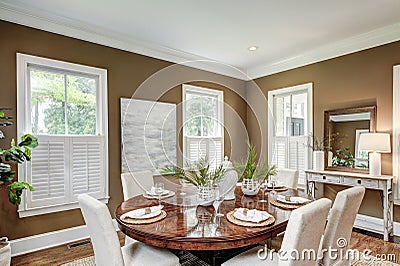 Spacious dining room interior with tasteful furniture Stock Photo