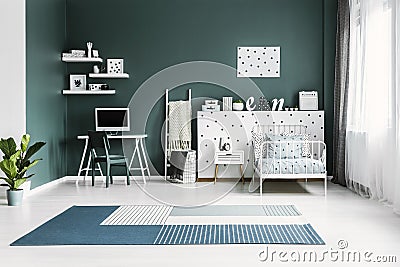 Spacious green kid`s room interior Stock Photo