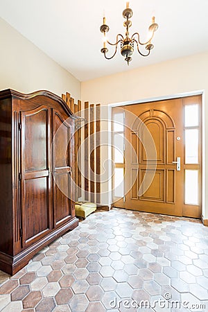 Spacious hallway with wooden wardrobe Stock Photo