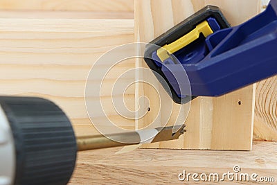 Spade drill bit and clamp Stock Photo