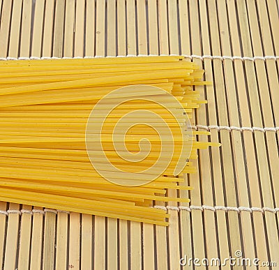 Spaghetti on bamboo background Stock Photo