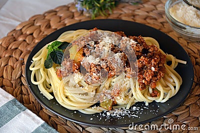 Spaghetti bolognese with parmesan cheese Stock Photo