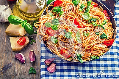 Spaghetti. Italian and Mediterranean cuisine. Spaghetti bolognese with cherry tomato and basil. Stock Photo