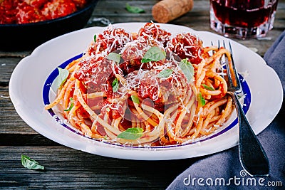 Spaghetti pasta with meatballs, tomato sauce and parmesan cheese Stock Photo