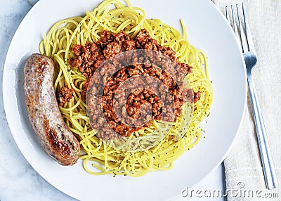 spaghetti top with a hmeat sauce and parsley Stock Photo