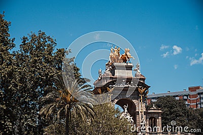 Spain, Barcelona - May 30 2022: A monumental two-level fountain in a classical style with an arch and a statue of Venus in the Editorial Stock Photo