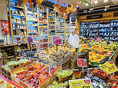 Grocery store with a large vegetable and fruit section Editorial Stock Photo