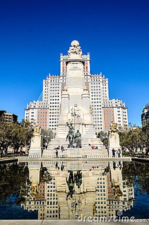 Spain building and quixote statue Editorial Stock Photo