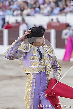 Spainish bullfighter Sebastian Castella taking the cap from him Editorial Stock Photo