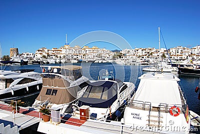 Pleasure boats moored in the harbour at Puerto Banus, Marbella. Editorial Stock Photo