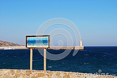 Harbour entrance and sign, Tarifa, Spain. Editorial Stock Photo