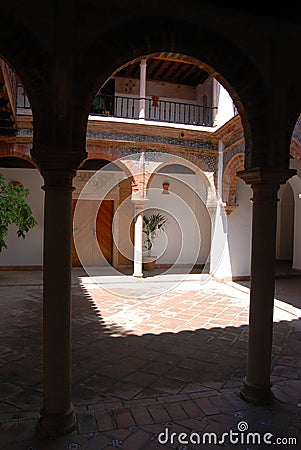 Courtyard with pretty balconies in the Mondragon Palace garden, Ronda, Spain. Stock Photo