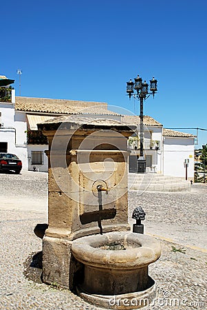 Drinking fountain in the Plaza Santa Lucia, Ubeda, Spain. Editorial Stock Photo