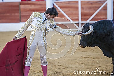 The Spanish Bullfighter Cayetano Rivera greeting the public with its cap in the hand in gratitude to its bullfight in the Bullring Editorial Stock Photo