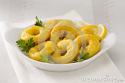 Spanish Cuisine. Fried Squid Rings. Calamares a la Romana. Stock Photo