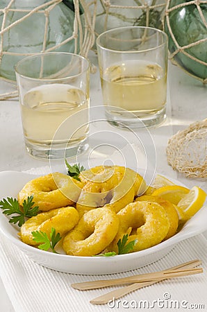 Spanish Cuisine. Fried Squid Rings. Calamares a la Romana. Stock Photo