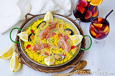 Spanish Cuisine. Paella and fresh sangria. Stock Photo