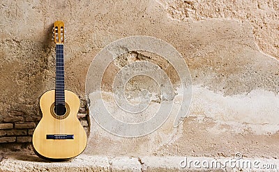 Spanish guitar on wall Stock Photo